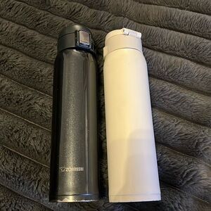 Two Zojirushi insulated bottles